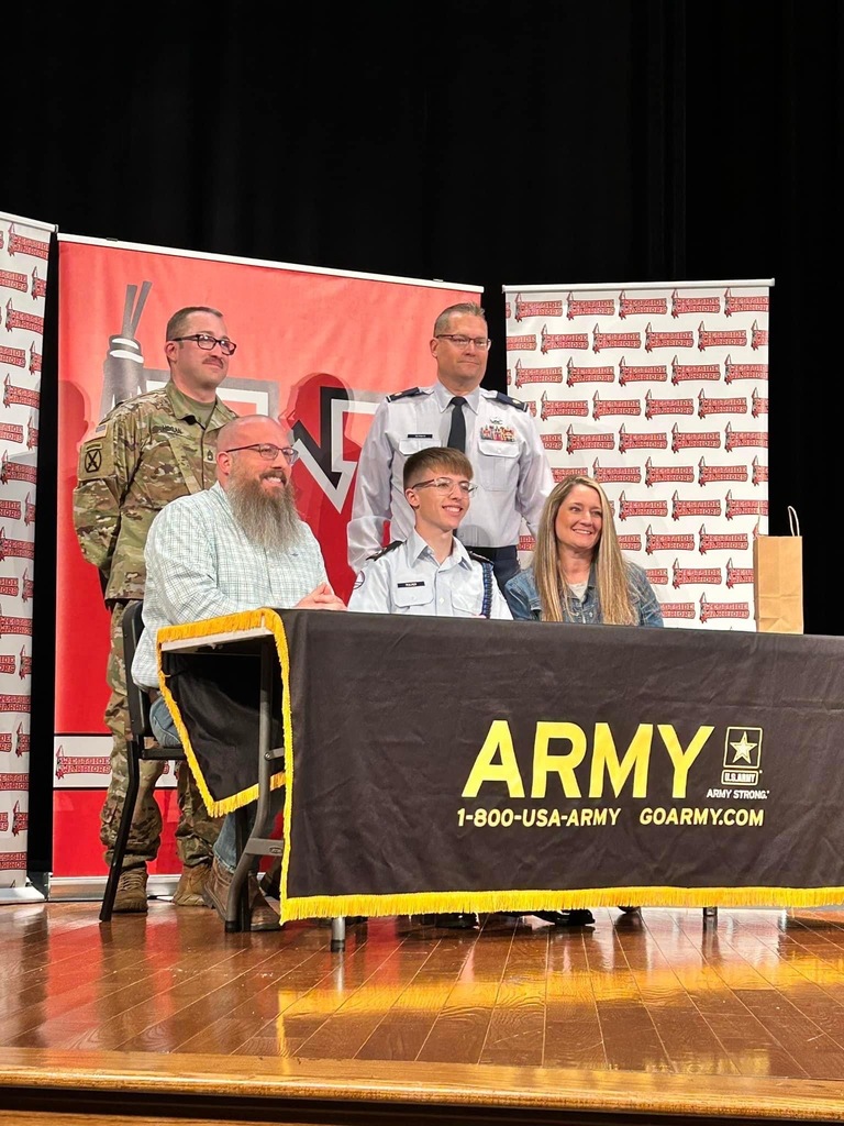 Logan Pulver siging with the Army Band